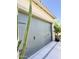 Garage door with raised panels and decorative hardware and drought resistant landscaping at 17985 W Jojoba Rd, Goodyear, AZ 85338