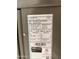 HVAC unit label showing Model and Serial Number EL18XCV-048-230A02 5824H07930 assembled in the USA at 17985 W Jojoba Rd, Goodyear, AZ 85338