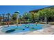 Colorful splash pad with fun water features, perfect for Gathering enjoyment at 17985 W Jojoba Rd, Goodyear, AZ 85338