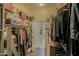 Spacious walk-in closet with ample shelving and hanging space at 17985 W Jojoba Rd, Goodyear, AZ 85338