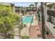 Aerial shot of the community pool, lounging area, and attractive landscaping at 1828 W Tuckey Ln # 13, Phoenix, AZ 85015