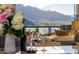 Balcony with wine and seating offers peaceful mountain views at 18720 N 101St St # 3006, Scottsdale, AZ 85255