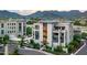 Elegant multi-story building with balconies and lush landscaping at 18720 N 101St St # 3006, Scottsdale, AZ 85255