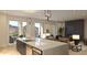 Bright kitchen with a large island, modern appliances, and expansive windows offering mountain views at 18720 N 101St St # 3006, Scottsdale, AZ 85255