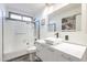 Clean bathroom featuring tile shower, square sink, and modern fixtures at 19440 N 12Th St, Phoenix, AZ 85024
