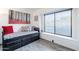 Cozy bedroom showcases a daybed with storage drawers and a sunlit window nook at 19440 N 12Th St, Phoenix, AZ 85024