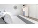 Inviting bedroom with neutral tones, wood-look floors, and closet access at 19440 N 12Th St, Phoenix, AZ 85024