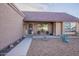 Charming single-story home with manicured gravel landscaping and cozy covered porch at 19440 N 12Th St, Phoenix, AZ 85024