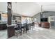 Stylish open-concept kitchen with granite island and stainless steel appliances at 19440 N 12Th St, Phoenix, AZ 85024