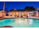 Beautiful backyard pool area with a covered patio perfect for outdoor entertaining at 19440 N 12Th St, Phoenix, AZ 85024