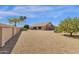 Aerial view of a home showcasing a spacious backyard with desert landscape at 19791 N 86Th Dr, Peoria, AZ 85382
