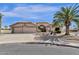 Exterior shot of this single story home with a three car garage and well manicured desert landscaping at 19791 N 86Th Dr, Peoria, AZ 85382