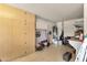 Spacious garage with ample storage cabinets and water heater at 19791 N 86Th Dr, Peoria, AZ 85382