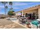 Outdoor patio and yard with mature landscaping, perfect for entertaining at 19791 N 86Th Dr, Peoria, AZ 85382
