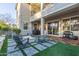 Backyard patio with a fire pit, barbeque, and outdoor workout area at 21073 W Sunrise Ln, Buckeye, AZ 85396