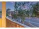 Balcony view of city with pink and orange sky during twilight hour at 21073 W Sunrise Ln, Buckeye, AZ 85396