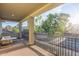 Expansive covered balcony providing ample space for relaxation and outdoor seating at 21073 W Sunrise Ln, Buckeye, AZ 85396