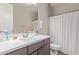 Bathroom vanity with mirror, ample counter space, and neutral finishes at 21073 W Sunrise Ln, Buckeye, AZ 85396