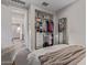 This bedroom features a closet with built-in shelving and drawers at 21073 W Sunrise Ln, Buckeye, AZ 85396