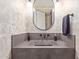 Stylish powder room features concrete sink and modern fixtures at 21073 W Sunrise Ln, Buckeye, AZ 85396