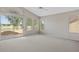 Spacious bedroom featuring neutral colors, large sliding glass door, and multiple windows for ample natural light at 21538 N 59Th Ln, Glendale, AZ 85308