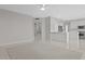 Bright living room featuring neutral tones, tile floors, and views to the kitchen at 21538 N 59Th Ln, Glendale, AZ 85308