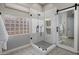 Modern main bathroom features a glass-enclosed shower, stylish tile work, and contemporary fixtures at 22036 N 44Th Pl, Phoenix, AZ 85050