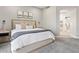 Calm primary bedroom with stylish décor, carpeted floors, and an ensuite bathroom with a glass shower at 22036 N 44Th Pl, Phoenix, AZ 85050