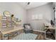Organized playroom featuring built-in storage and a cozy seating area for relaxation at 22036 N 44Th Pl, Phoenix, AZ 85050