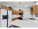 Well-lit kitchen with a breakfast bar, efficient appliances, and ample counter space for meal prep at 2736 Leisure World --, Mesa, AZ 85206