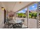 This covered patio offers beautiful views to the backyard and an enjoyable place to relax and unwind at 2736 Leisure World --, Mesa, AZ 85206