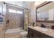Beautiful bathroom features a vanity with marble counters, tiled shower and flooring at 29431 N 23Rd Dr Dr, Phoenix, AZ 85085