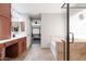 Bathroom featuring a shower behind glass, soaking tub, and vanity at 29431 N 23Rd Dr Dr, Phoenix, AZ 85085