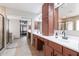 Bathroom with double sinks, vanity and mirrors and a shower behind glass wall at 29431 N 23Rd Dr Dr, Phoenix, AZ 85085