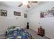 Neutral carpet, ceiling fan and a large closet add appeal to this lovely bedroom at 29431 N 23Rd Dr Dr, Phoenix, AZ 85085