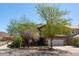 Charming two-story home features a two car garage, desert landscaping, and mature shade trees at 29431 N 23Rd Dr Dr, Phoenix, AZ 85085
