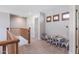 Bright upstairs hallway with table and chairs at 29431 N 23Rd Dr Dr, Phoenix, AZ 85085