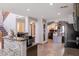 Open-concept kitchen with modern appliances and view into the adjacent living spaces at 29431 N 23Rd Dr Dr, Phoenix, AZ 85085