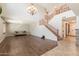 Spacious living room featuring wood floors, high ceilings, and an elegant chandelier at 29431 N 23Rd Dr Dr, Phoenix, AZ 85085