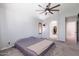 Main bedroom features an ensuite bathroom and a ceiling fan at 29431 N 23Rd Dr Dr, Phoenix, AZ 85085