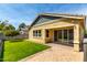 This charming home offers a lovely backyard with green grass and a covered patio at 3023 E Arabian Dr, Gilbert, AZ 85296