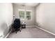 Bedroom currently set up as an office space, with windows providing natural light at 3023 E Arabian Dr, Gilbert, AZ 85296