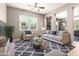 Inviting living room featuring neutral tones, plush seating, modern decor, and great natural light at 3023 E Arabian Dr, Gilbert, AZ 85296