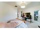 Spacious bedroom features plush carpeting, overhead lighting, and adjoins walk-in closet at 3153 E Ivanhoe St, Gilbert, AZ 85295