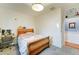 Bright bedroom with plush carpeting, natural lighting, and desk area at 3153 E Ivanhoe St, Gilbert, AZ 85295