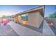 The exterior features paved walkways, manicured landscaping, and an outdoor kitchen at 3153 E Ivanhoe St, Gilbert, AZ 85295