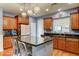 Well-appointed kitchen featuring stainless steel appliances, granite countertops, and ample cabinet space at 3153 E Ivanhoe St, Gilbert, AZ 85295