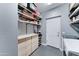 Large walk-in closet features built in storage units, shelving, and drawers for easy organization at 3153 E Ivanhoe St, Gilbert, AZ 85295