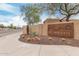 Community entrance sign with attractive desert landscaping at 317 W Tonopah Dr # 2, Phoenix, AZ 85027