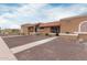 View of the lovely, single-story house with rock landscaping and a tidy sidewalk at 317 W Tonopah Dr # 2, Phoenix, AZ 85027